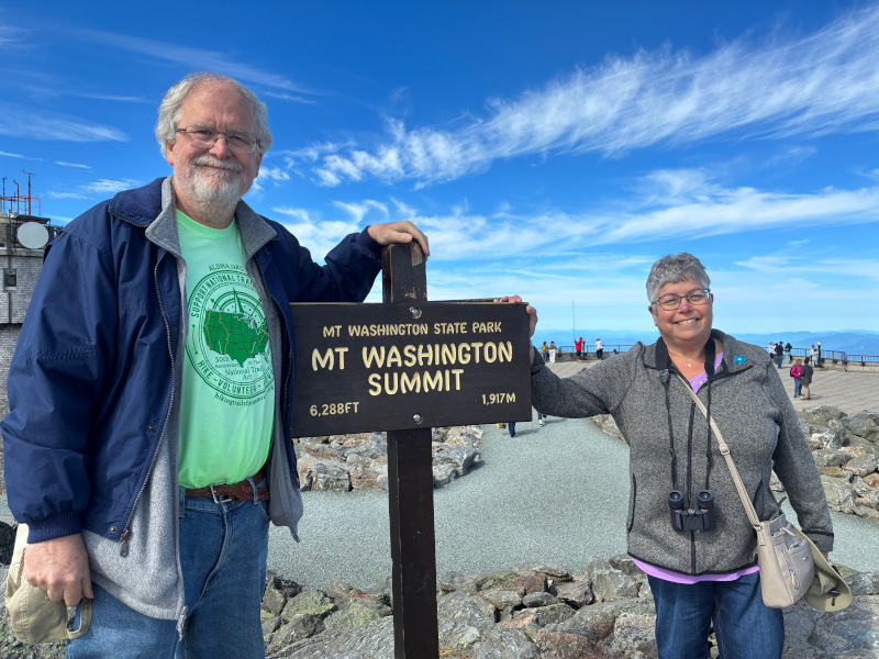 Monday, August 18, 2025, Stuart and Julie on the summit of Mount Washington -- highest peak in the northeastern United States at 6,288.2 feet!