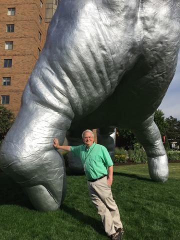 Stuart with Judy's Hand Pavilion sculpture at Front International Cleveland Triennial for Contemporary Art in UpTown Cleveland