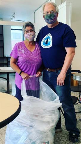Shanelle Smith Whigham's photo of Julie and Stuart at #Masks4Community. Note that Stuart is wearing the Pacific Crest Trail shirt that Julie gave him.